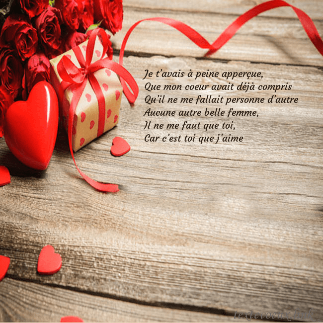 Carte de vœux avec coeur rouge et cadeau Je t’avais à peine apperçue,
Que mon coeur avait d Carte de vœux avec coeur rouge et cadeau