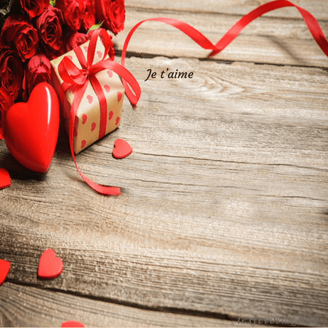 Carte de vœux avec coeur rouge et cadeau